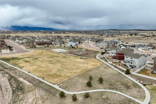 an aerial view of a town with houses and a road at Clear Creek Cozy Getaway with Private Patio in Pikeview