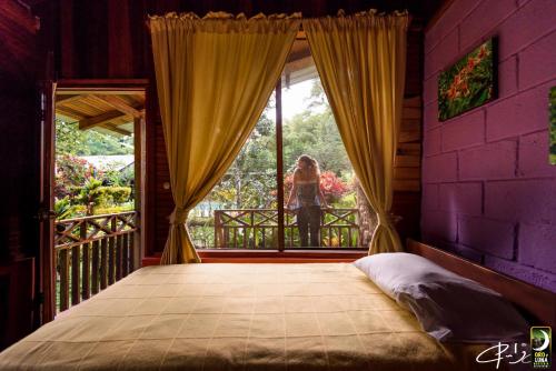 Cama o camas de una habitación en Oro y Luna Lodge