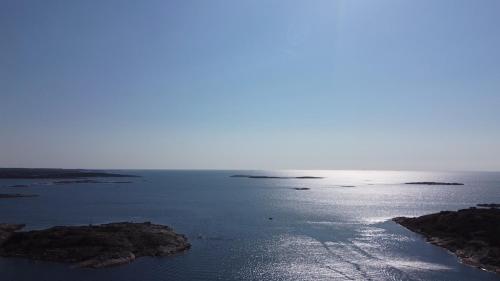 an aerial view of a body of water at Sauna&Jacuzzi-New guesthouse, private in nature in Vallda