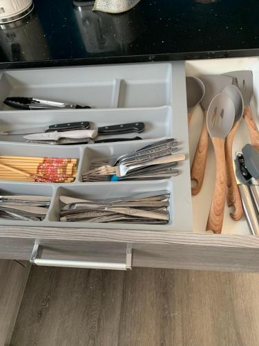 a drawer full of utensils in a kitchen at Regent Residential House in Whangarei