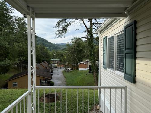 a view from the porch of a house at Delightful 2 Bedroom Model Home in Pigeon Forge