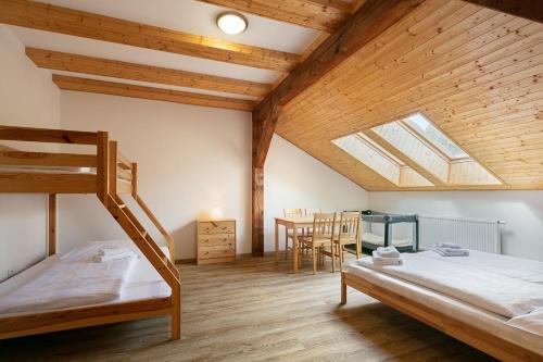 Postel nebo postele na pokoji v ubytování Apartment Vlčice u Trutnova