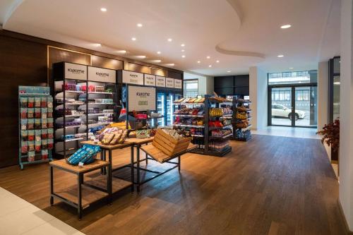 a store with a lot of products on display at Vienna House by Wyndham Andel's Berlin in Berlin