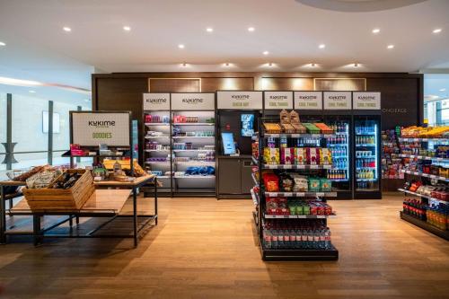 a store filled with lots of different types of products at Vienna House by Wyndham Andel's Berlin in Berlin
