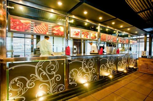 En restaurant eller et andet spisested på Well Park Residence Boutique Hotel & Suites