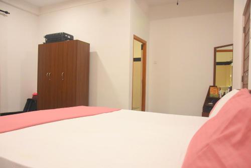 Ένα ή περισσότερα κρεβάτια σε δωμάτιο στο Vienna Villa