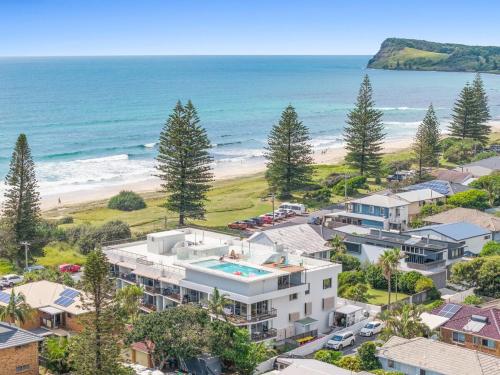 an aerial view of a house and the beach at Lennox Head Waves 2 Beachside Apartment in Lennox Head