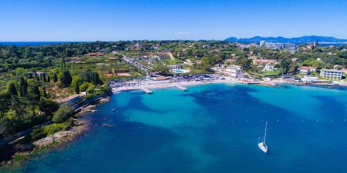 a boat in a large body of water at L'orangerai d'Antibes in Antibes