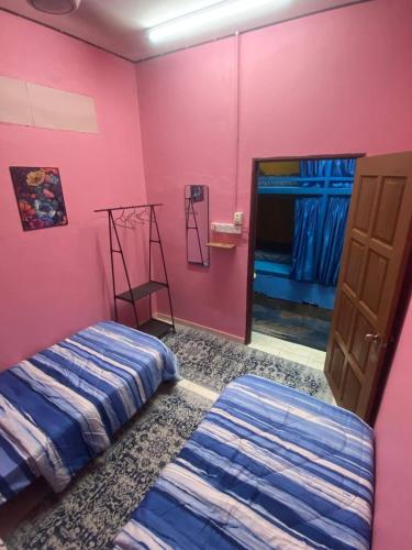 Hostel Qamaarにあるベッド