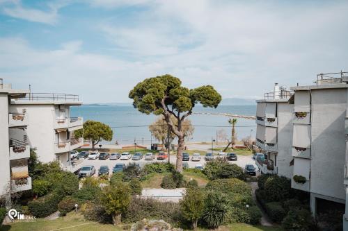 an aerial view of a parking lot with cars at 'Nefeli' House With Amazing View Βy The Sea in Nea Makri
