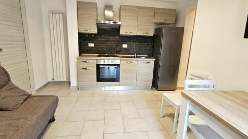 Η κουζίνα ή μικρή κουζίνα στο Pretty Home Fiumicino