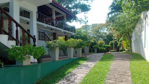 a view of the side of a building at Rockery Villa Ayurveda in Bentota