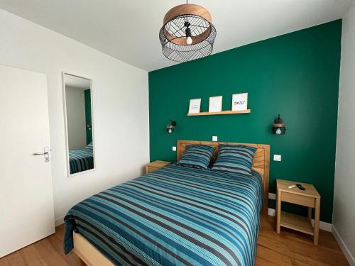 Ένα ή περισσότερα κρεβάτια σε δωμάτιο στο Green Escape proxi Bordeaux