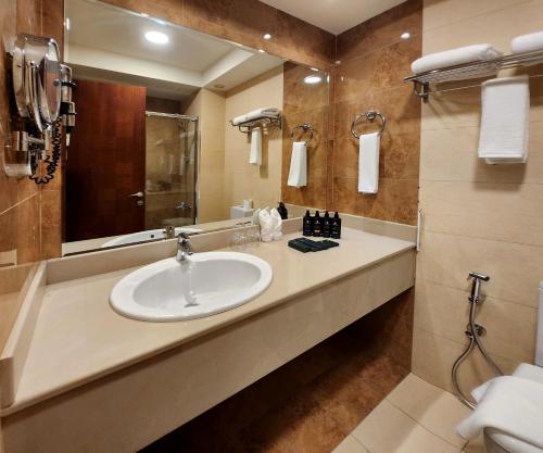 Koupelna v ubytování AMR ACACIA Hotel