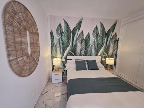 En eller flere senge i et værelse på Sunny Beach Apartment Marbella