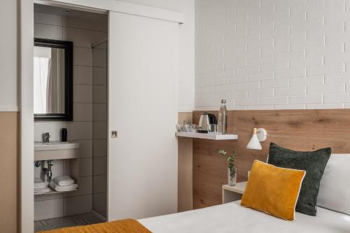 Ένα ή περισσότερα κρεβάτια σε δωμάτιο στο BYPILLOW House