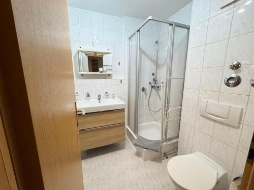Koupelna v ubytování 1 Zimmer Apartment mit Balkon