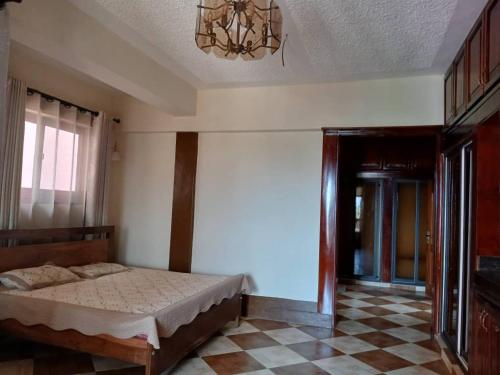 Ένα ή περισσότερα κρεβάτια σε δωμάτιο στο Hotel Acacia View