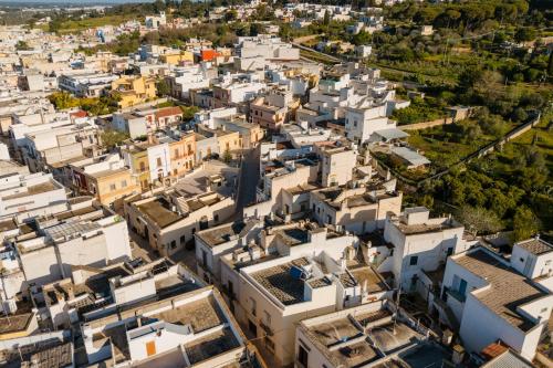 an aerial view of a city with white houses at Luxury 12 in Tuglie