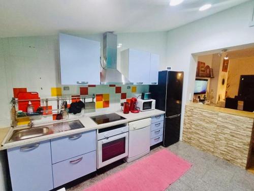 Kuchyň nebo kuchyňský kout v ubytování Nice Penthouse