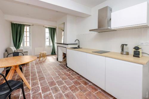 Nhà bếp/bếp nhỏ tại L'appartement du centre - Hypercentre - Lavaur
