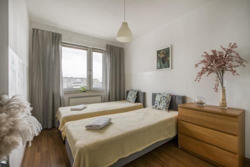 Ένα ή περισσότερα κρεβάτια σε δωμάτιο στο Gama Home Wyspowa 1