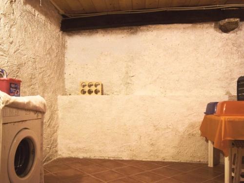 a laundry room with a washer and dryer at B&B Levigliani in Levigliani