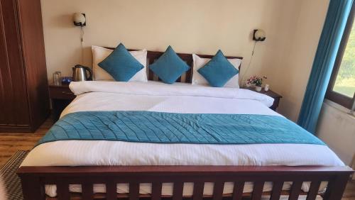 Ένα ή περισσότερα κρεβάτια σε δωμάτιο στο O M G Home Stay