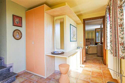a hallway of a house with a counter and a room at Rustico alla Spiaggia in Carmine