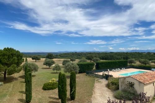an aerial view of a villa with a garden and a swimming pool at 04B8 Beautiful T3 in the heart of lavender - pool in Brunet
