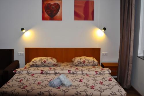 Llit o llits en una habitació de Welcome&Enjoy 1