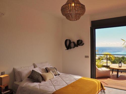 Ένα ή περισσότερα κρεβάτια σε δωμάτιο στο Villa Bel Horizon