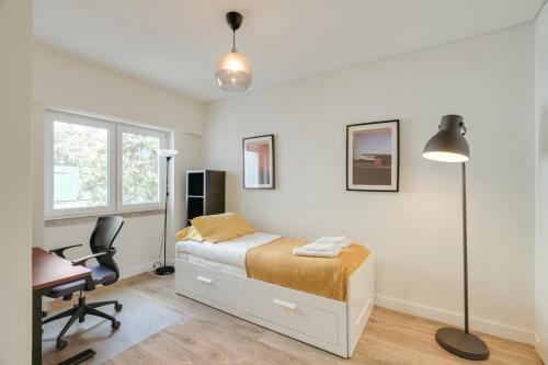 Flat w/ Balcony & Workspace by HostWise