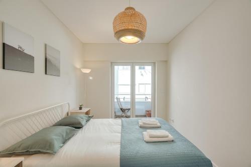 Flat w/ Balcony & Workspace by HostWise