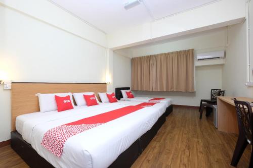 Ένα ή περισσότερα κρεβάτια σε δωμάτιο στο Hotel O 75