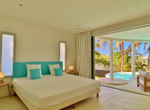 Ένα ή περισσότερα κρεβάτια σε δωμάτιο στο Villa Stella Bianca