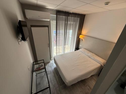 Postel nebo postele na pokoji v ubytování Hotel Bed and Breakfast Benidorm
