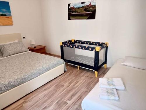Postel nebo postele na pokoji v ubytování Casa Cencioni