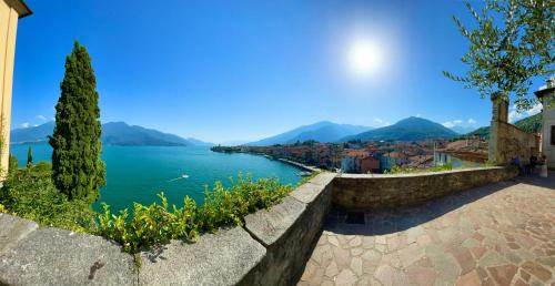 a view of a river with mountains in the background at Casa Viola - Near the beach in Domaso