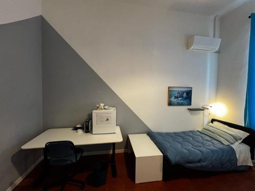 Postel nebo postele na pokoji v ubytování Mezzano B&B