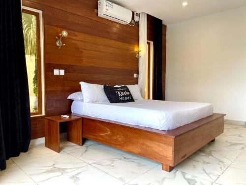 Katil atau katil-katil dalam bilik di Kwetu Luxury Villa