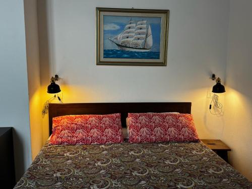 Postel nebo postele na pokoji v ubytování Mezzano B&B