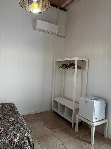 Postel nebo postele na pokoji v ubytování Mezzano B&B