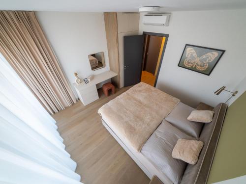 Ένα ή περισσότερα κρεβάτια σε δωμάτιο στο Eurovea Tower Apartment free Parking