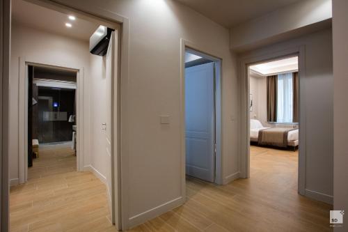 Cavour Suite Apartmentsにあるベッド