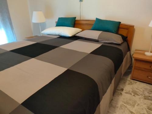 a bed with two pillows on it in a bedroom at casa vacanze relais in Fara San Martino