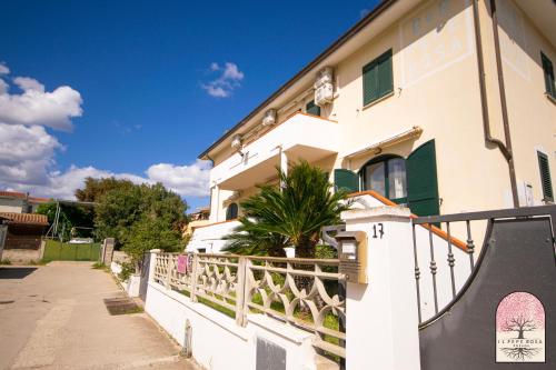 a house with a skateboard ramp in front of it at Il Pepe Rosa in Posada