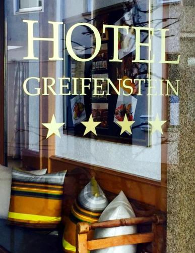 a window of a store with stars on it at Greifensteiner Hof in Würzburg