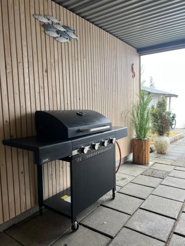 a barbecue grill sitting on top of a patio at Eidfjord Fjell in Eidfjord