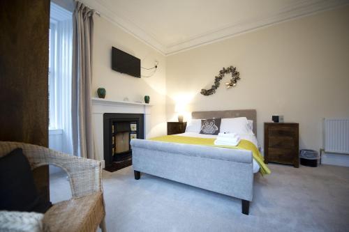 Katil atau katil-katil dalam bilik di Springfield guest house